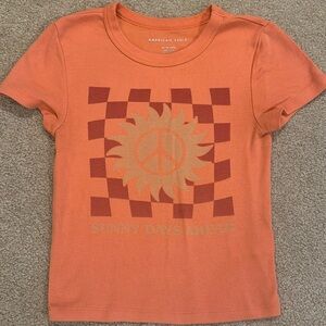 American eagle baby T size XS in orange